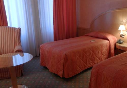 Imagen de la habitación del Hotel Agora' Palace. Foto 10