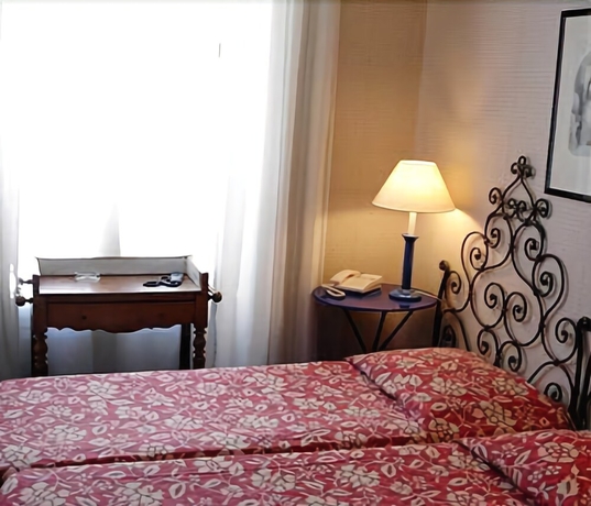 Imagen de la habitación del Hotel Agora, París. Foto 14