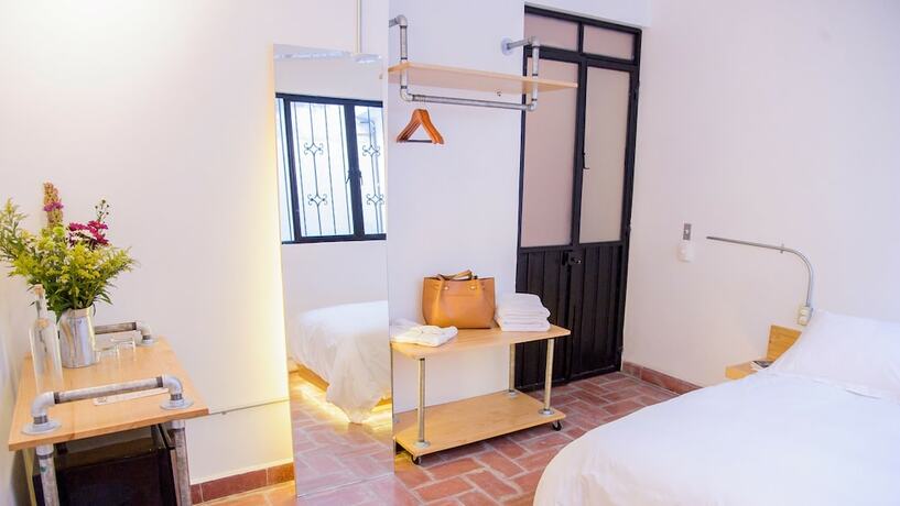 Imagen de la habitación del Hotel Agrado Guest House. Foto 18