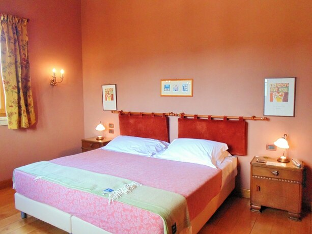 Imagen de la habitación del Hotel Agrirelais Baglio di Pianetto. Foto 11