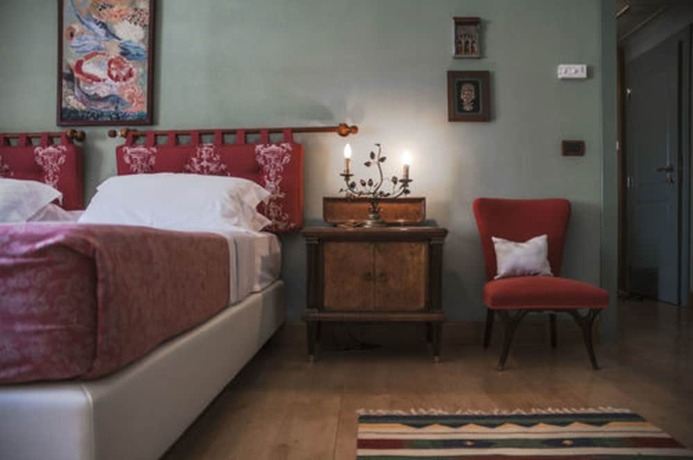 Imagen de la habitación del Hotel Agrirelais Baglio di Pianetto. Foto 16