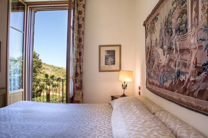 Imagen de la habitación del Hotel Agrirelais Baglio di Pianetto. Foto 20