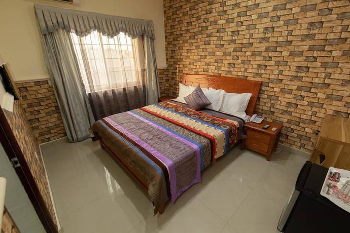 Imagen de la habitación del Hotel Ags and Suites. Foto 2