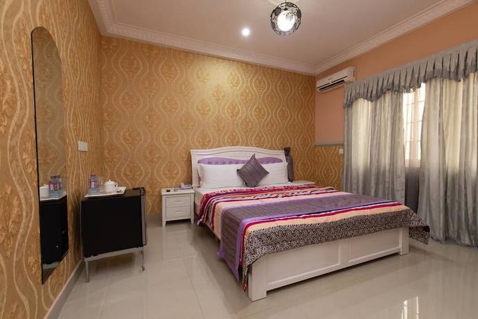 Imagen de la habitación del Hotel Ags and Suites. Foto 9