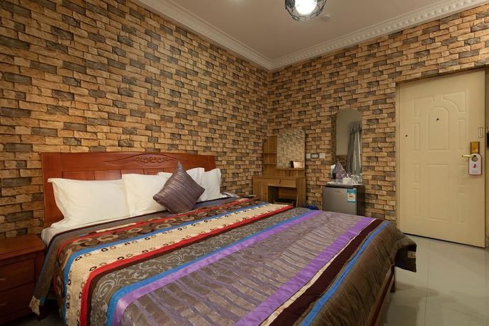 Imagen de la habitación del Hotel Ags and Suites. Foto 14