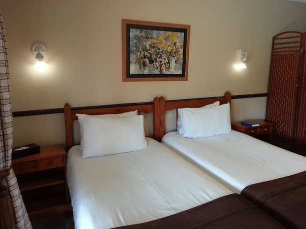 Imagen de la habitación del Hotel Agterplaas Guesthouse Bandb. Foto 6