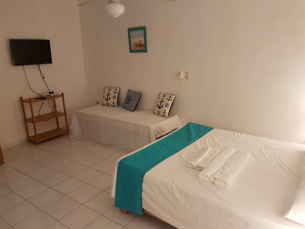 Imagen de la habitación del Hotel Agua Dulce. Foto 14