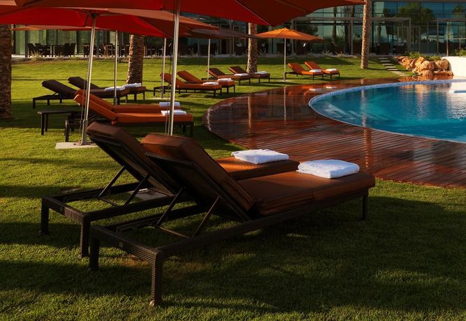 Imagen de la piscina del Hotel Aguas de Ibiza by NCalma Hotels. Foto 11