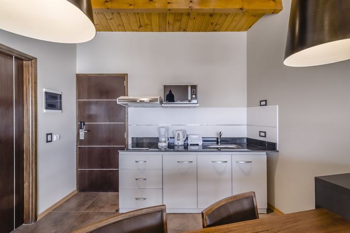 Imagen de la habitación del Hotel Aguila Mora Suites and Spa. Foto 8