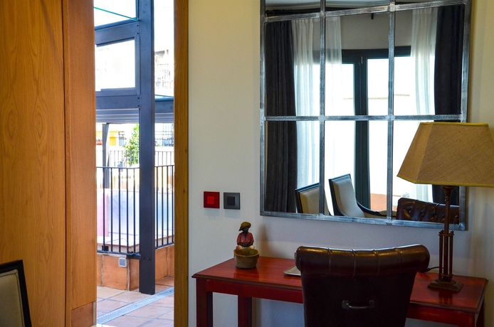 Imagen de la habitación del Hotel Aguilas5 Sevillasuites. Foto 4