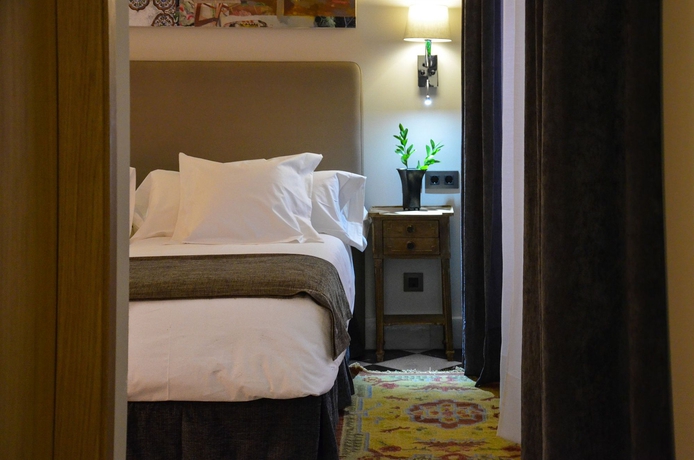 Imagen de la habitación del Hotel Aguilas5 Sevillasuites. Foto 10