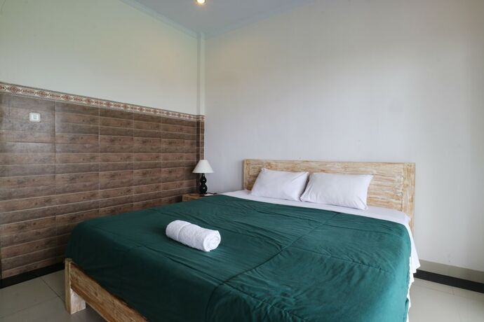 Imagen de la habitación del Hotel Agung Homestay Canggu. Foto 25