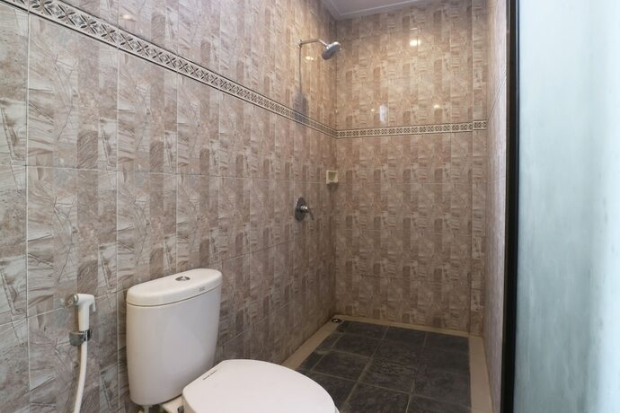 Imagen de la habitación del Hotel Agung Homestay Canggu. Foto 27