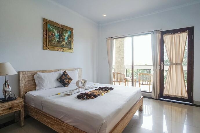 Imagen de la habitación del Hotel Agung Homestay Canggu. Foto 28