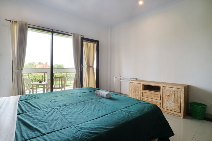 Imagen de la habitación del Hotel Agung Homestay Canggu. Foto 29