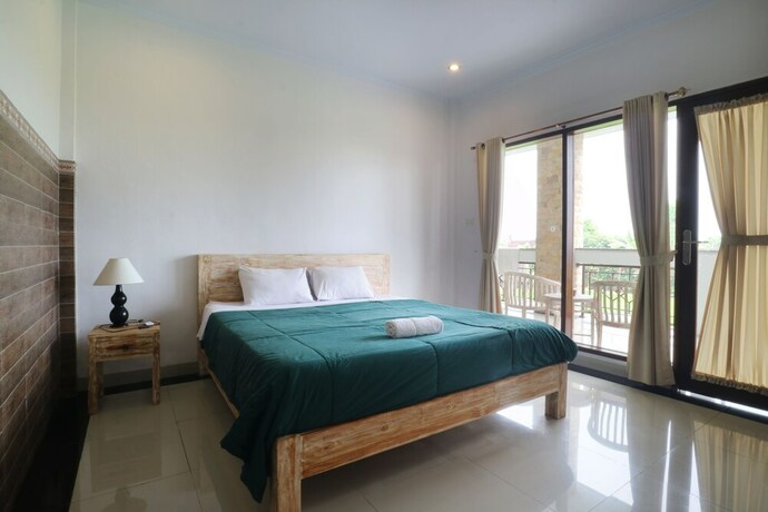 Imagen de la habitación del Hotel Agung Homestay Canggu. Foto 31