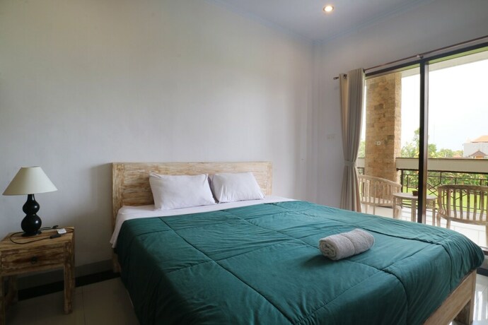 Imagen de la habitación del Hotel Agung Homestay Canggu. Foto 35
