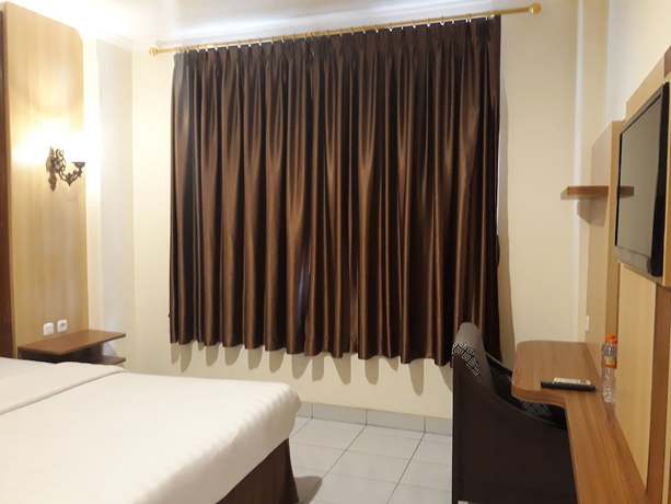 Imagen de la habitación del Hotel Agung Mas. Foto 3