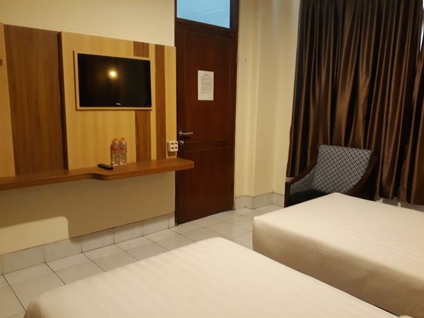 Imagen de la habitación del Hotel Agung Mas. Foto 8