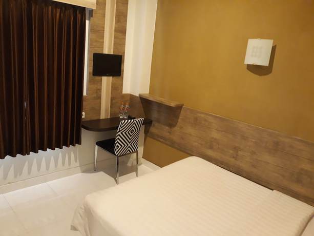 Imagen de la habitación del Hotel Agung Mas. Foto 9