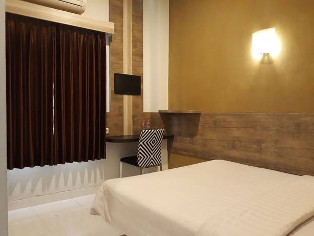 Imagen de la habitación del Hotel Agung Mas. Foto 10