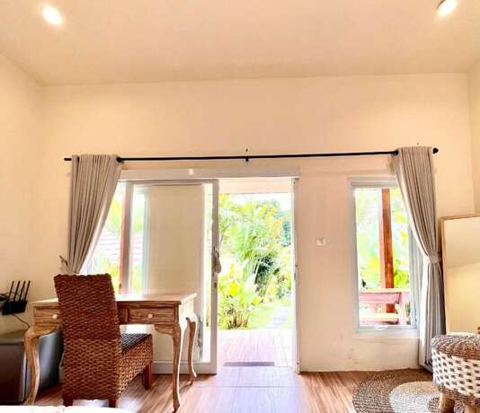 Imagen de la habitación del Hotel Agung Wiwin Homestay. Foto 19