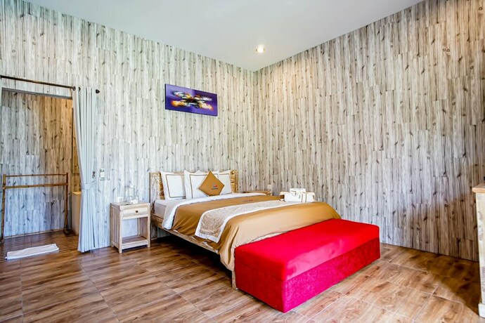 Imagen de la habitación del Hotel Agung Wiwin Homestay. Foto 20