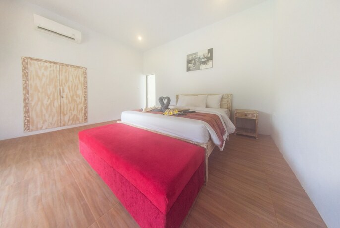 Imagen de la habitación del Hotel Agung Wiwin Homestay. Foto 29