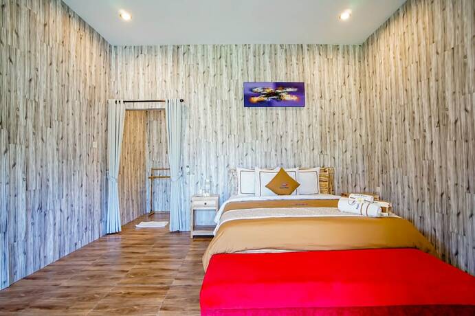 Imagen de la habitación del Hotel Agung Wiwin Homestay. Foto 30