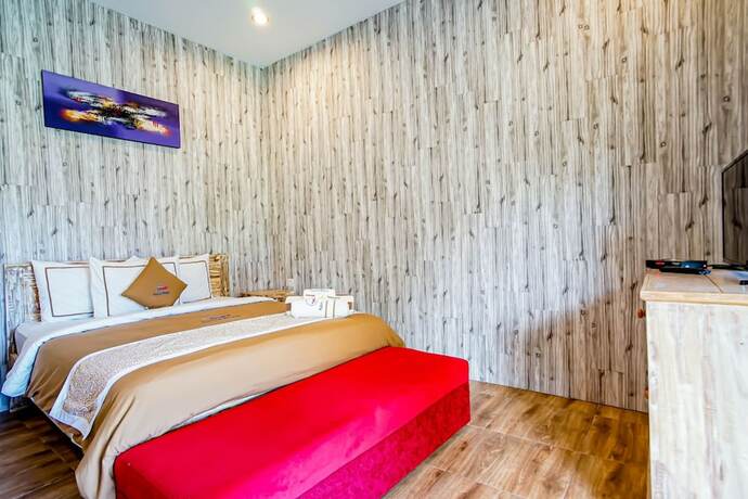 Imagen de la habitación del Hotel Agung Wiwin Homestay. Foto 32