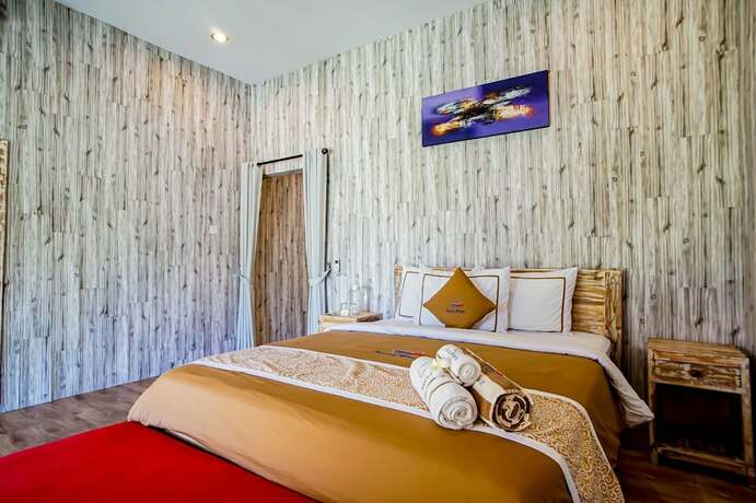 Imagen de la habitación del Hotel Agung Wiwin Homestay. Foto 38