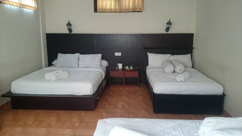 Imagen de la habitación del Hotel Agus Beach Inn. Foto 11