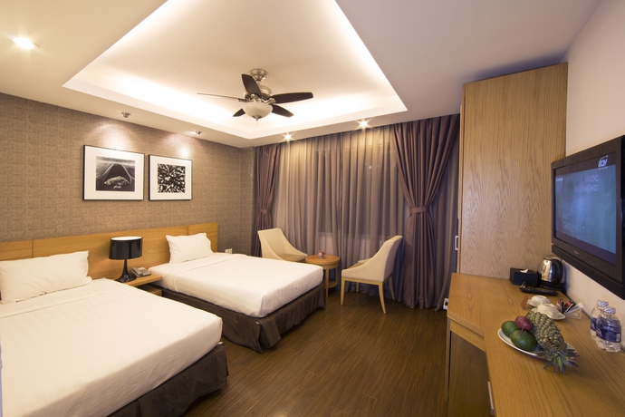 Imagen de la habitación del Hotel Aha Boutique Ben Thanh. Foto 9