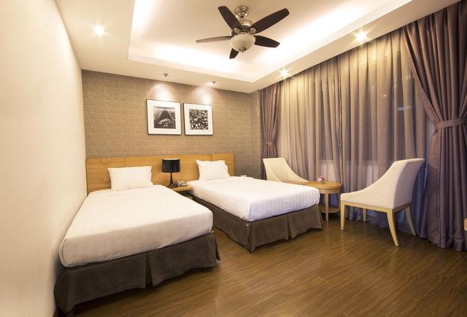 Imagen de la habitación del Hotel Aha Boutique Ben Thanh. Foto 15