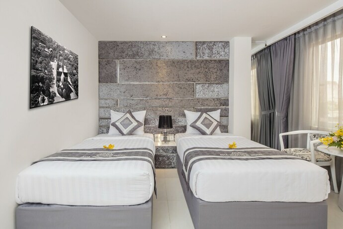 Imagen de la habitación del Hotel Aha Boutique. Foto 10