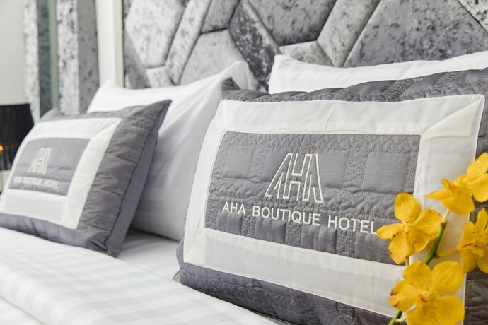 Imagen de la habitación del Hotel Aha Boutique. Foto 12