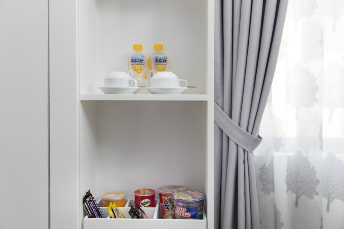 Imagen de la habitación del Hotel Aha Boutique. Foto 14