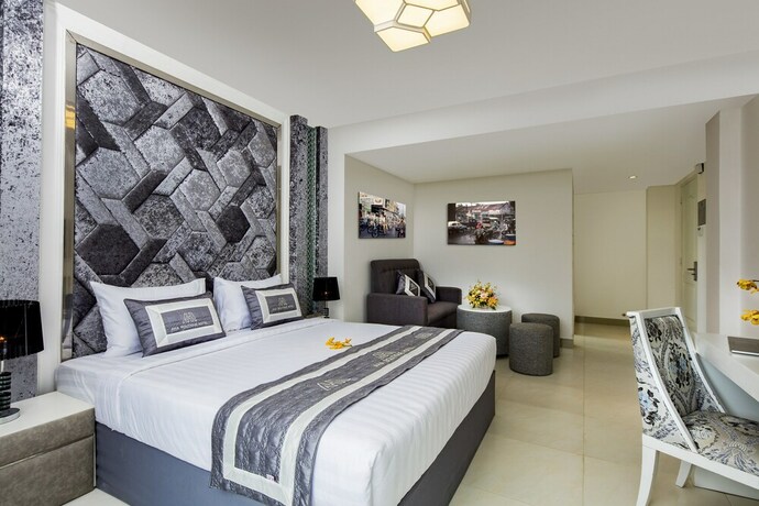 Imagen de la habitación del Hotel Aha Boutique. Foto 15