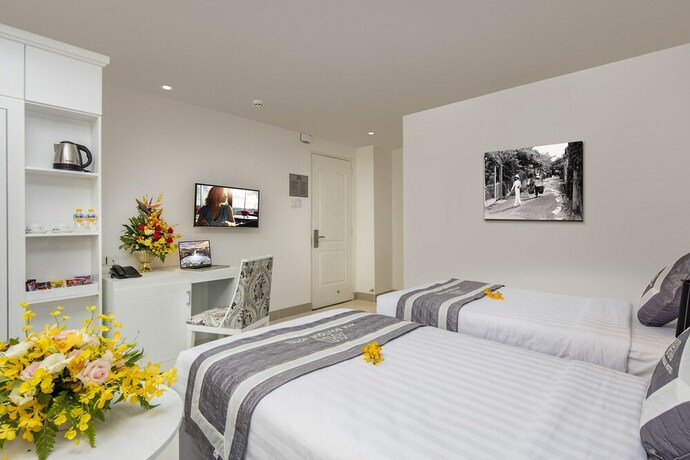 Imagen de la habitación del Hotel Aha Boutique. Foto 16