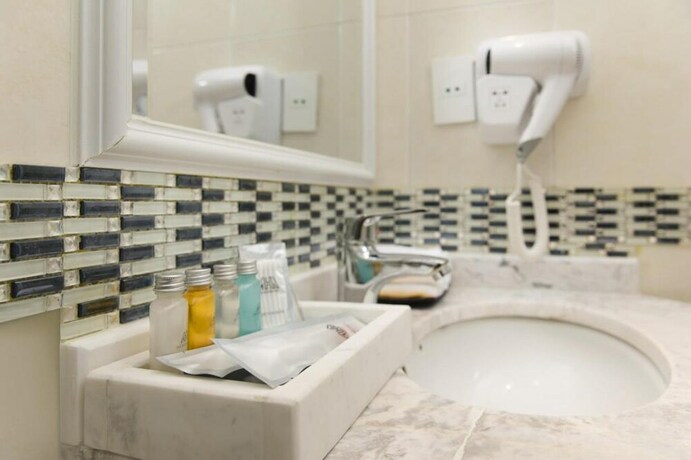 Imagen de la habitación del Hotel Aha Boutique. Foto 17
