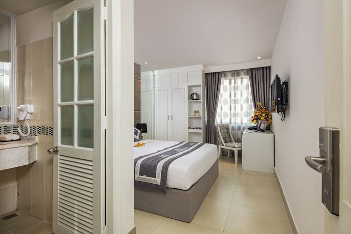 Imagen de la habitación del Hotel Aha Boutique. Foto 18