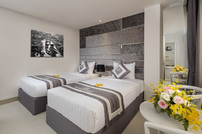 Imagen de la habitación del Hotel Aha Boutique. Foto 19