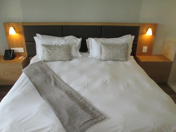 Imagen de la habitación del Hotel Aha Gateway. Foto 4