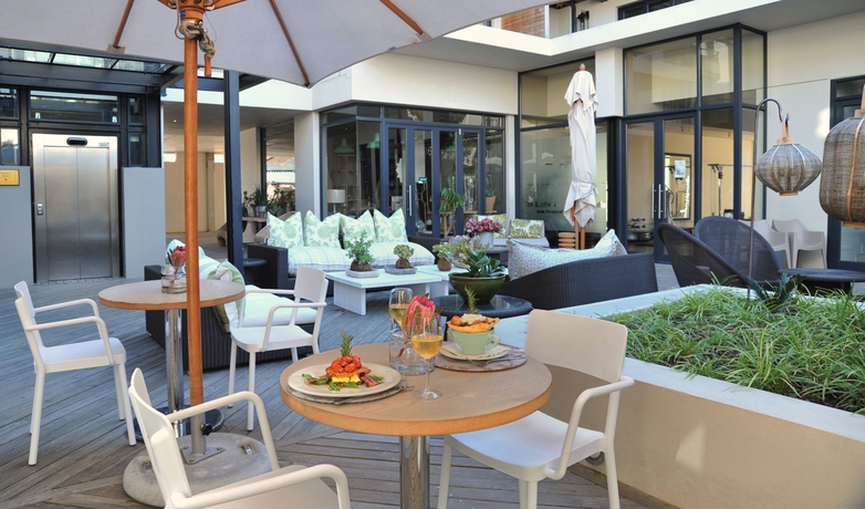 Imagen del bar/restaurante del Hotel Aha The Rex. Foto 4