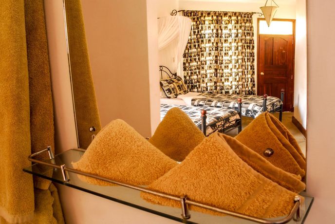 Imagen de la habitación del Hotel Ahadi Lodge. Foto 17