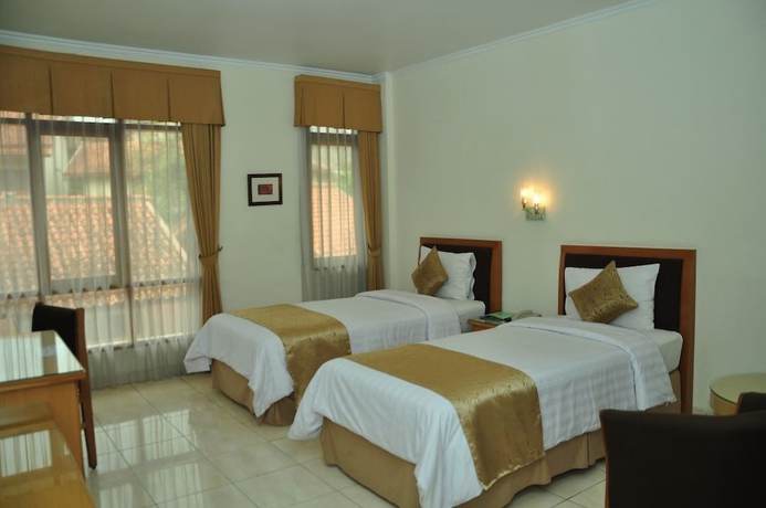 Imagen de la habitación del Hotel Ahadiat and Bungalow, Sukagalih. Foto 2