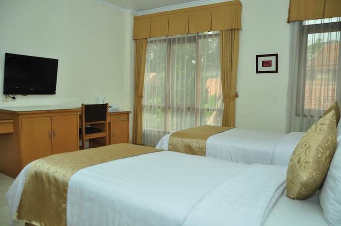 Imagen de la habitación del Hotel Ahadiat and Bungalow, Sukagalih. Foto 4