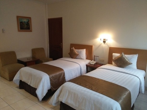 Imagen de la habitación del Hotel Ahadiat and Bungalow, Sukagalih. Foto 7
