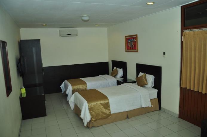 Imagen de la habitación del Hotel Ahadiat and Bungalow, Sukagalih. Foto 10