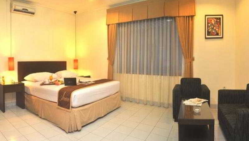 Imagen de la habitación del Hotel Ahadiat and bungalow, Bandung. Foto 11